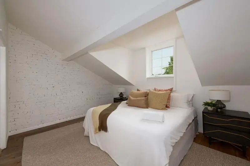 Attic bedroom with sloped ceiling, 1880s Glam
