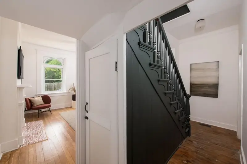 Restored original staircase with black railings, 1880s Glam