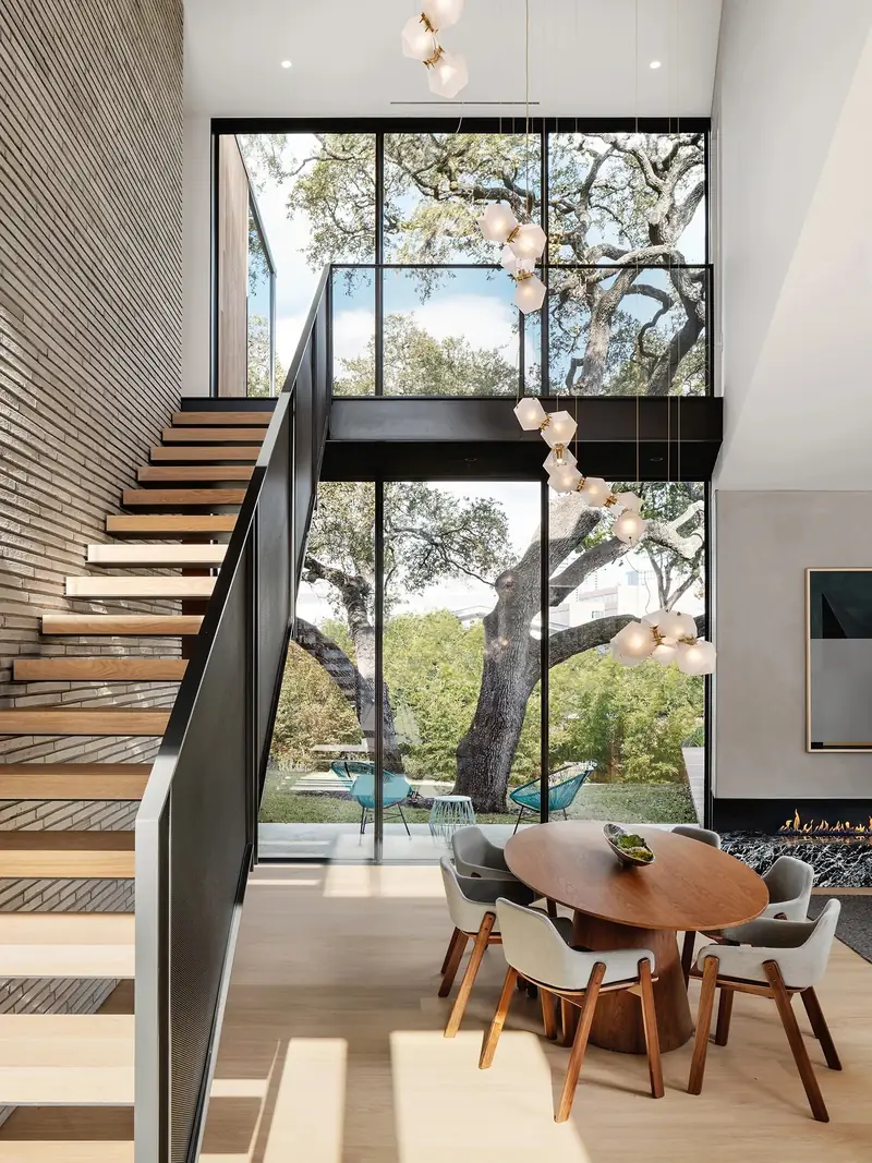 Floating wood staircase beside the dining area, Casa Retama