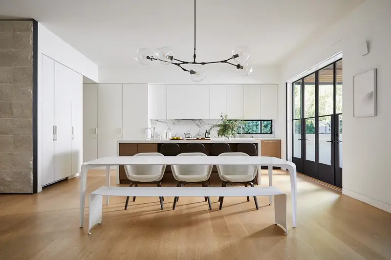 Dining area with sculptural chandelier, Stone Haven