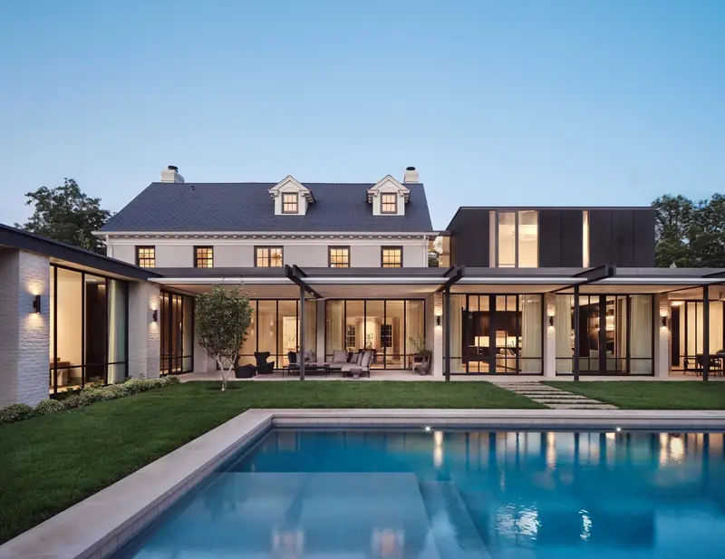 West Lynn main house at dusk with pool